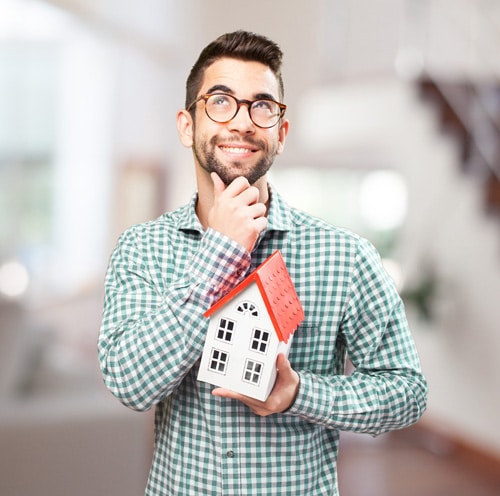 man holding a house